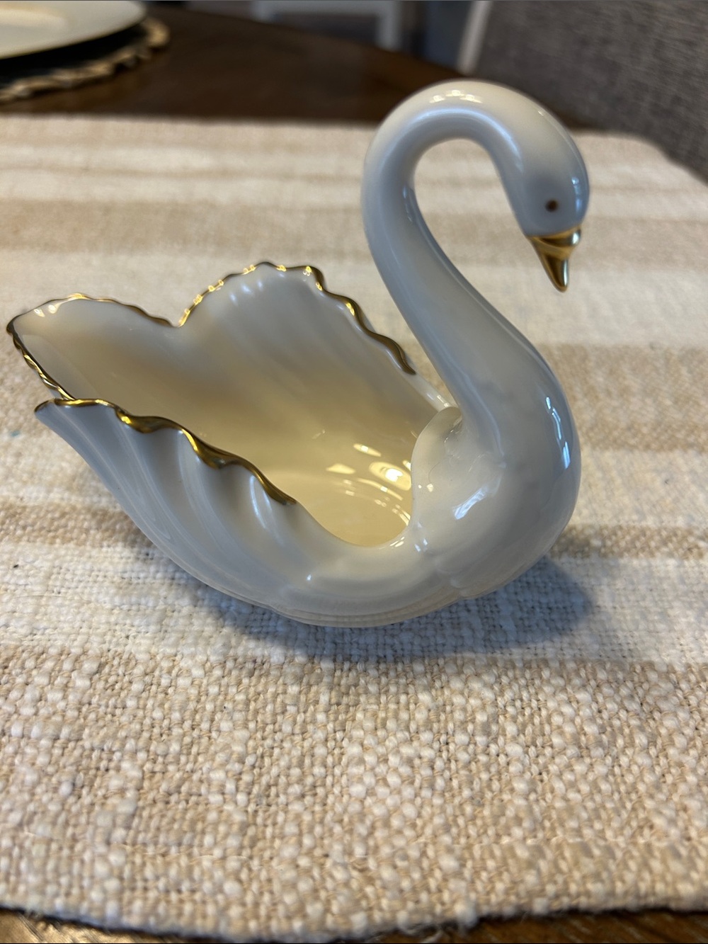 Lenox swan with gold trim, gold beak and eyes